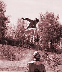 Person jumping on mountainboard